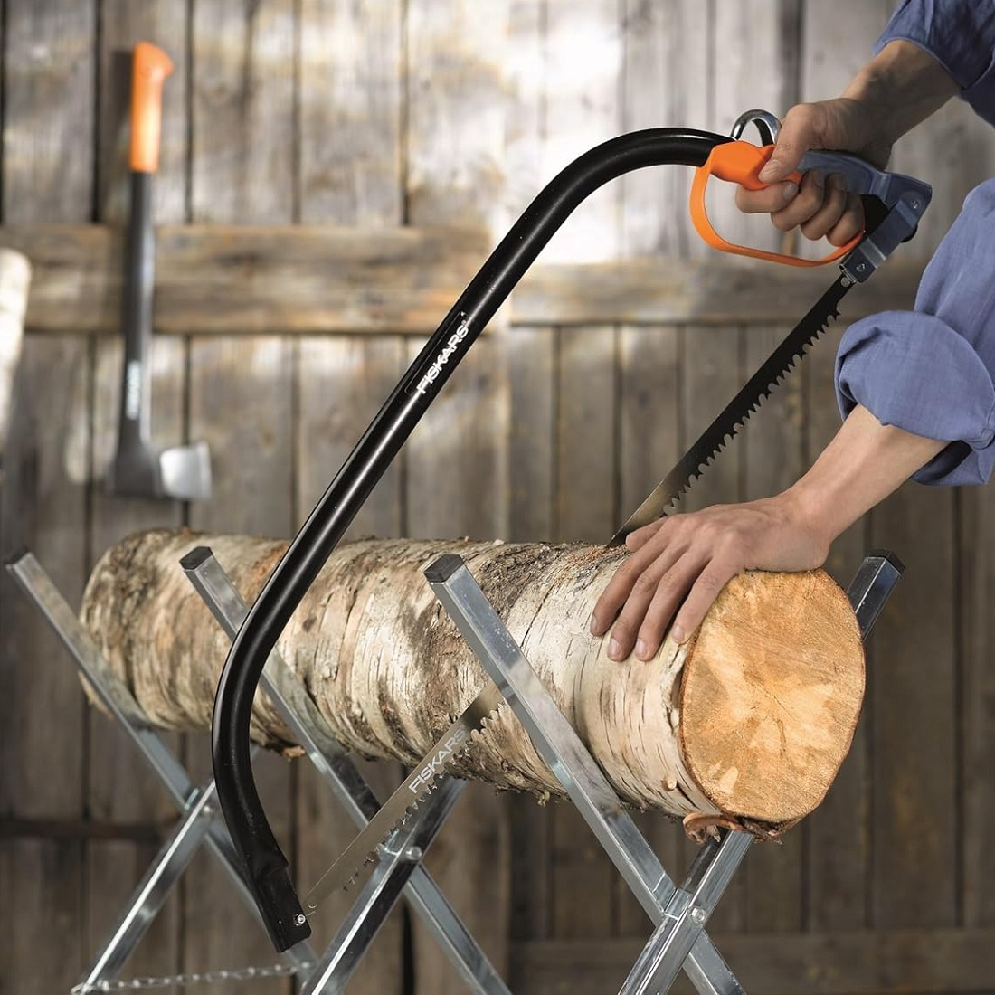 Fiskars 21-Inch Tree Pruning Bowsaw cutting large log