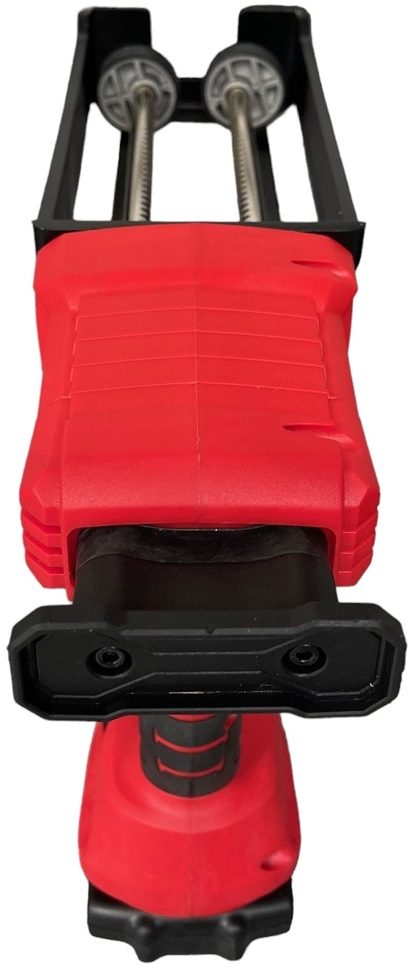 Front view of a red and black electric battery epoxy grout application gun with dual rods.
