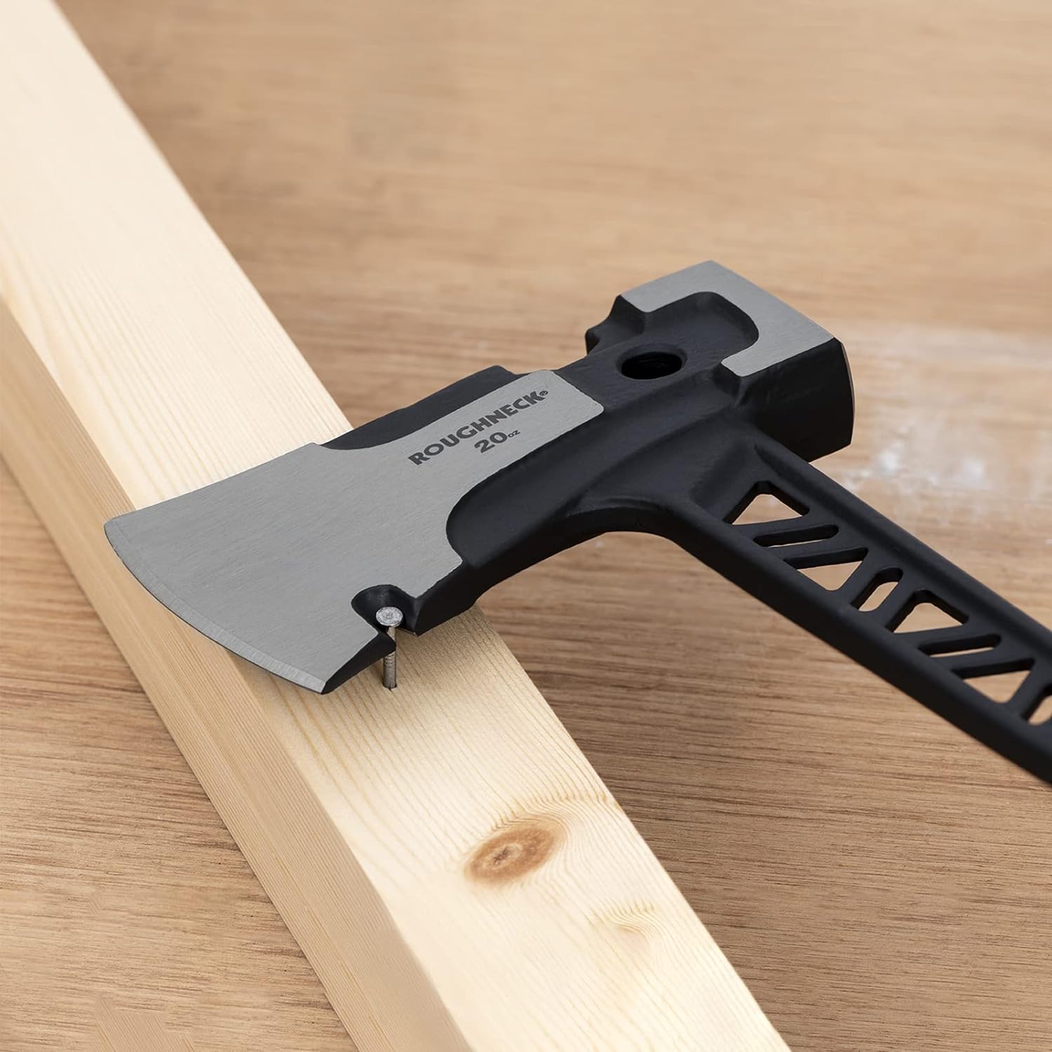 Roughneck Gorilla V Series Utility Hand Axe placed on a wooden plank.