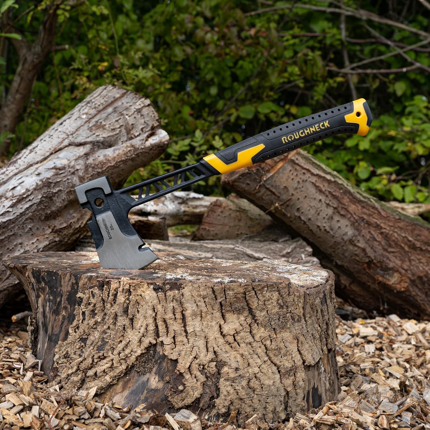 Roughneck Gorilla V Series Utility Hand Axe placed on a tree stump with logs in the background.