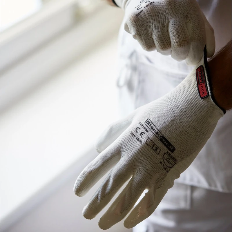 Person wearing BlackRock lightweight gripper work gloves in size 10, XL.
