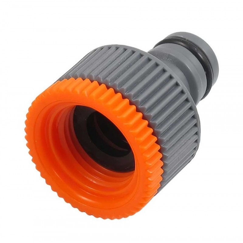 Close-up of a grey and orange threaded garden tap quick connector.