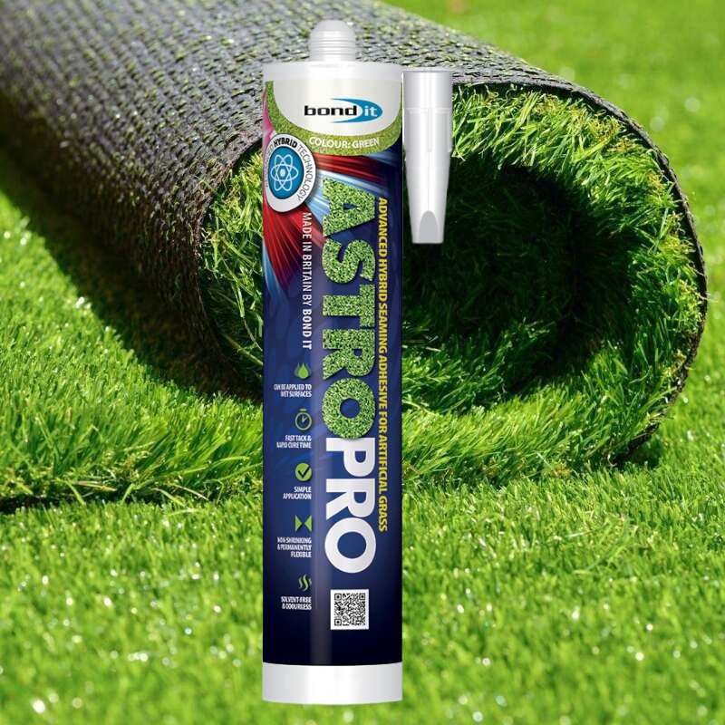 Tube of Bond It Astro Turf Pro Adhesive in front of rolled artificial grass.