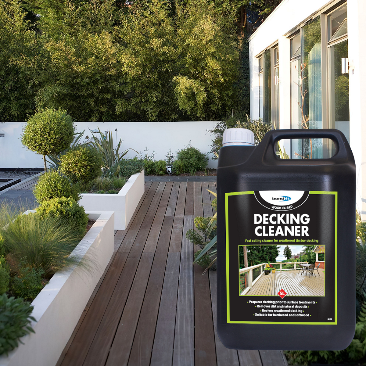 Bond It Drive Alive Decking Cleaner 5L bottle on a wooden deck with garden plants.