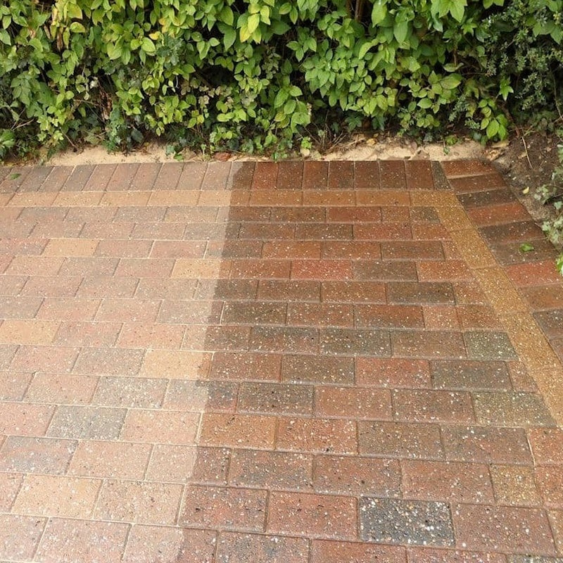 Comparison of block paving with and without high gloss sealer, showing enhanced colour and protection.