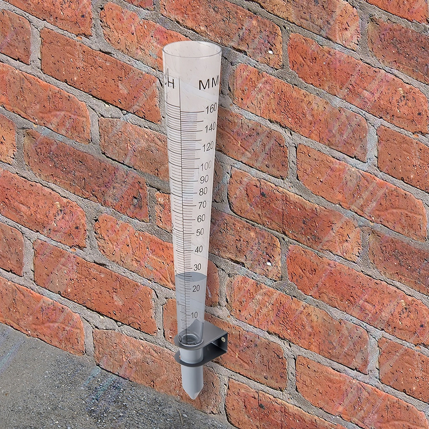 Rainfall measurement gauge mounted on a brick wall, showing measurements up to 160mm.