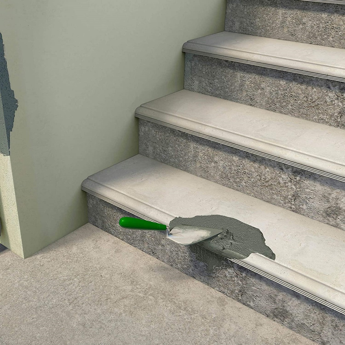 A trowel applying rapid setting cement to a damaged step for repair.