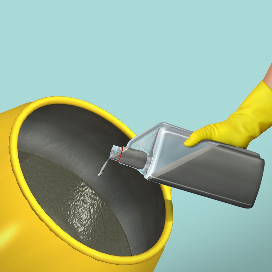 A person wearing yellow gloves pouring Everbuild Opti-mix Super Concentrate Render Additive into a yellow mixing container.