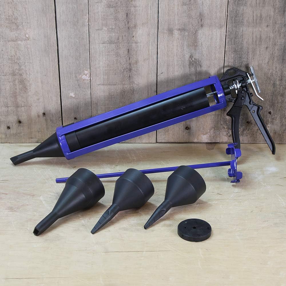 Faithfull mortar and cement pointing gun kit with accessories displayed on a wooden surface.