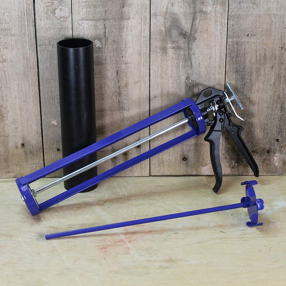 Faithfull mortar and cement pointing gun kit with nozzle and tube on a wooden background.
