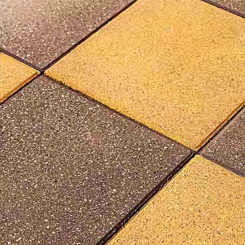 Close-up of natural stone tiles treated with a colour enhancer and sealer.