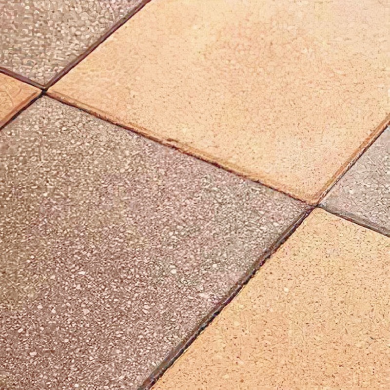 Close-up of natural stone tiles treated with a colour enhancer and sealer.