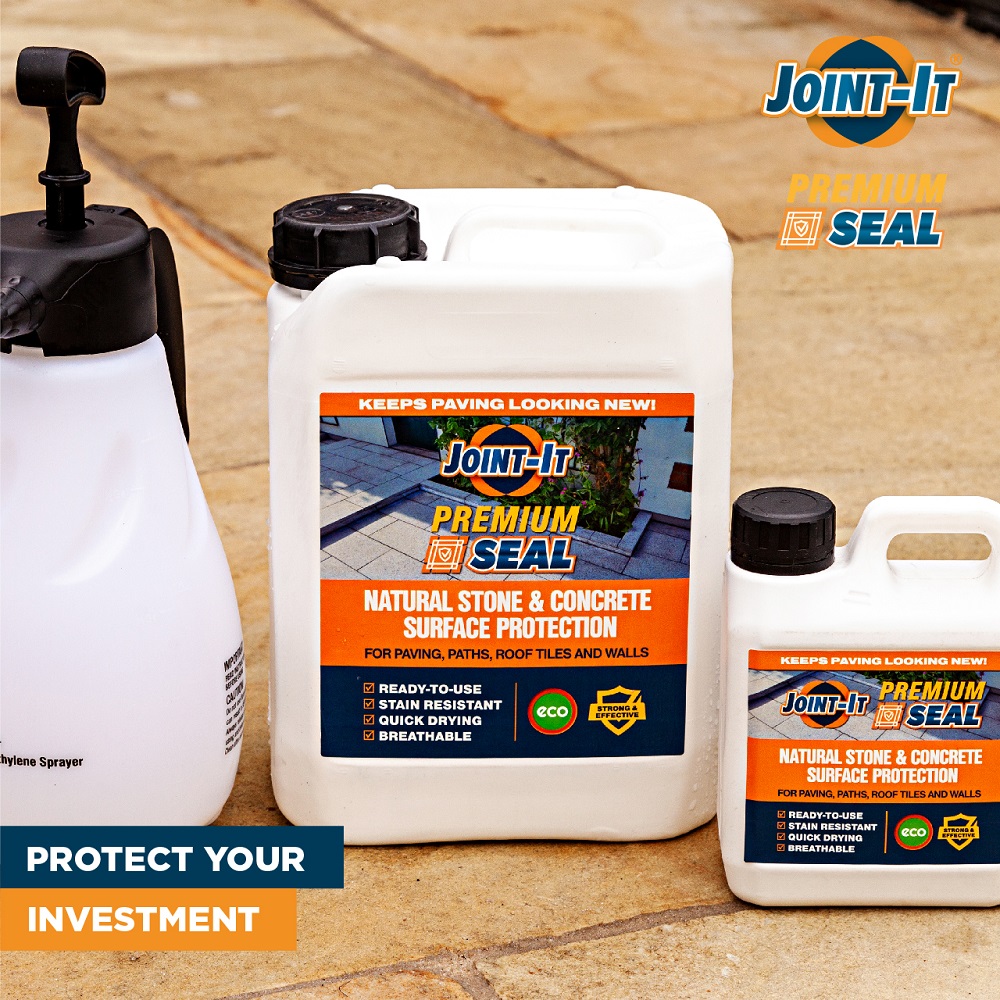 Joint It Premium Seal containers for natural stone and concrete protection on a paved surface.