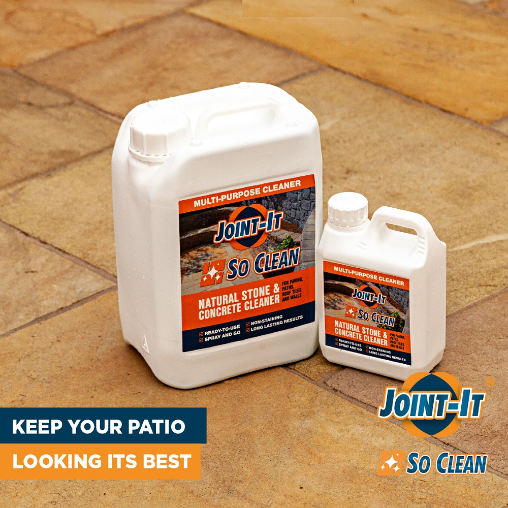 Two bottles of Joint It So Clean Masonry Patio and Stone Stain Cleaner on a stone patio.