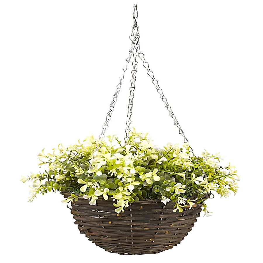 A round wicker hanging flower basket with green and white flowers.
