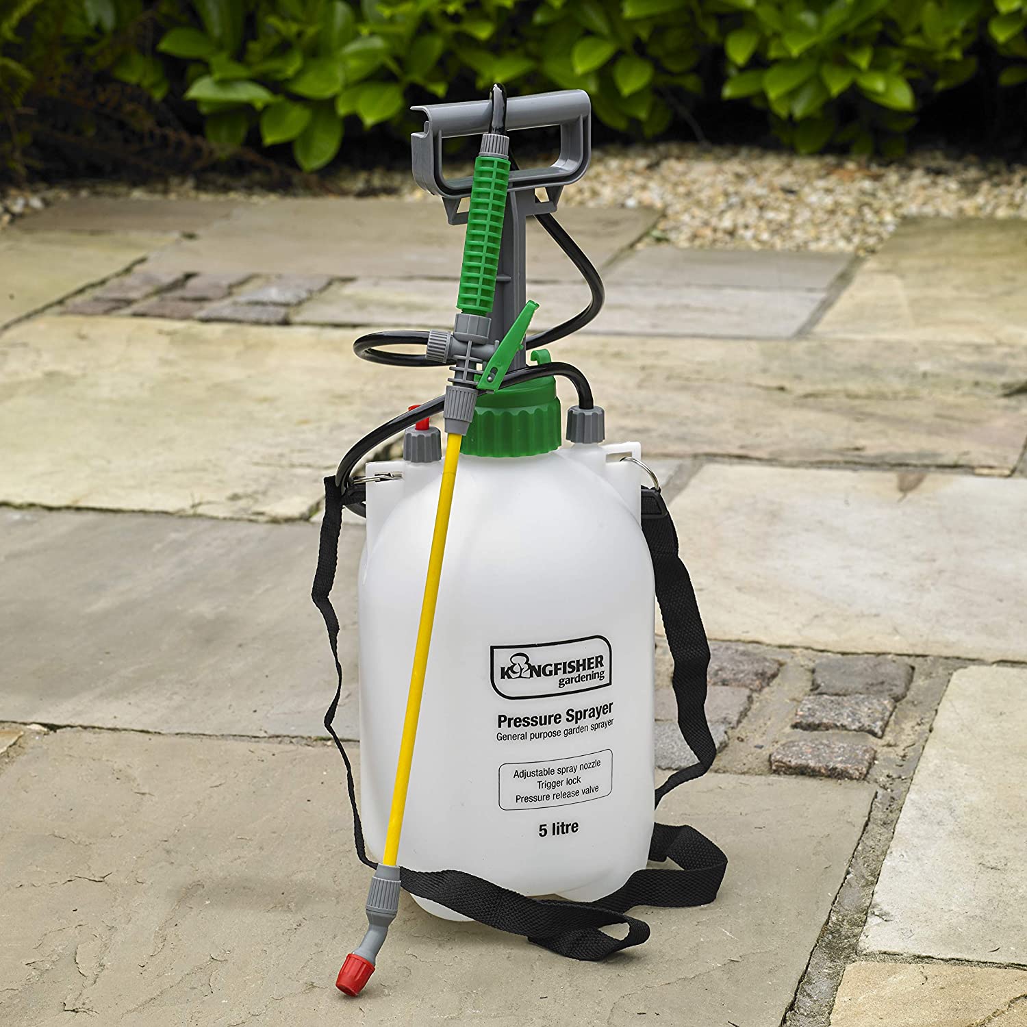Kingfisher Garden 5L Pump Action Pressure Sprayer with a yellow nozzle and black strap on a stone patio.