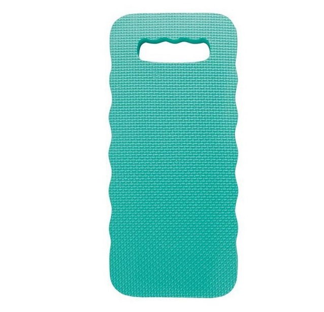 Green knee protection pad with textured surface and handle for garden and hard floor use.