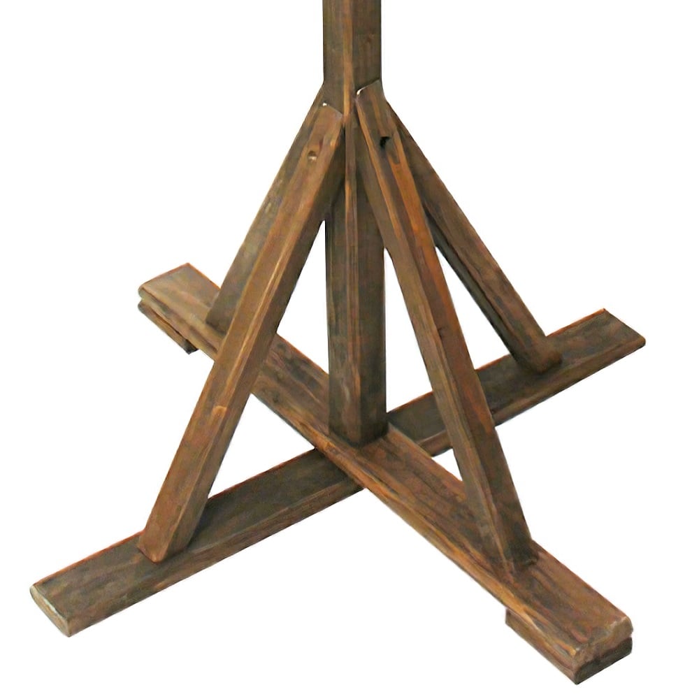 Close-up of the wooden base of a rustic garden wild bird table.