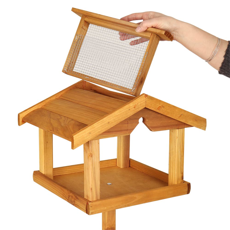 Wooden bird table with a built-in nut feeder, featuring a hinged roof for easy access.
