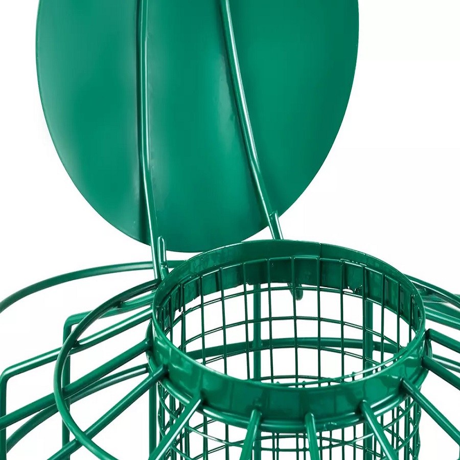 Close-up of a green squirrel guard nut and peanut bird feeder with a mesh design.