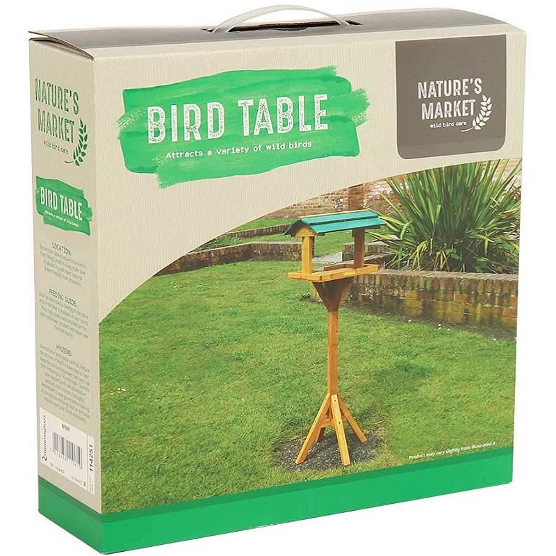 Packaging of Nature’s Market Traditional Wooden Garden Bird Table with an  the bird table in a garden setting.