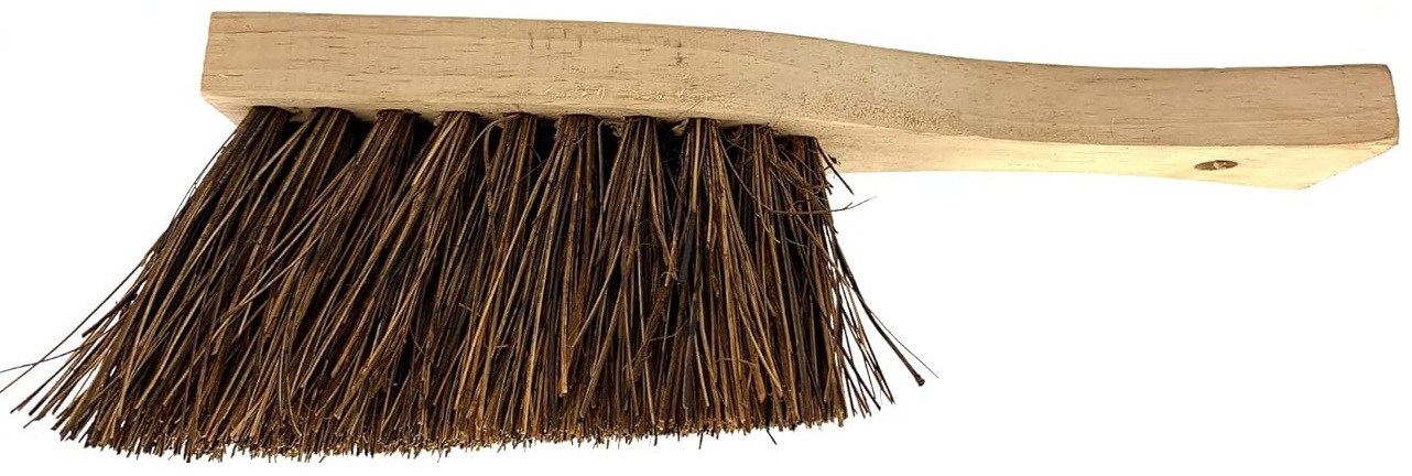Wooden-handled churn brush with stiff bristles for cleaning masonry and brickwork.