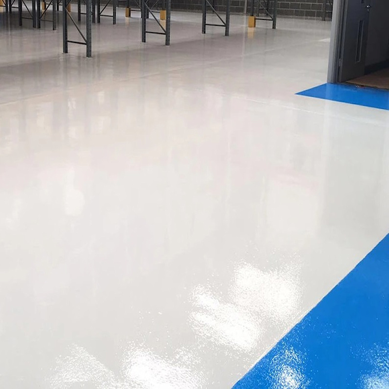 A smooth, freshly painted industrial floor with a glossy finish.