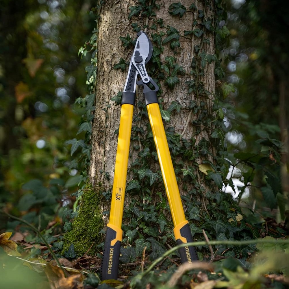 Roughneck XT PRO Heavy Duty Garden Bypass Lopping Shears leaning against a tree with ivy