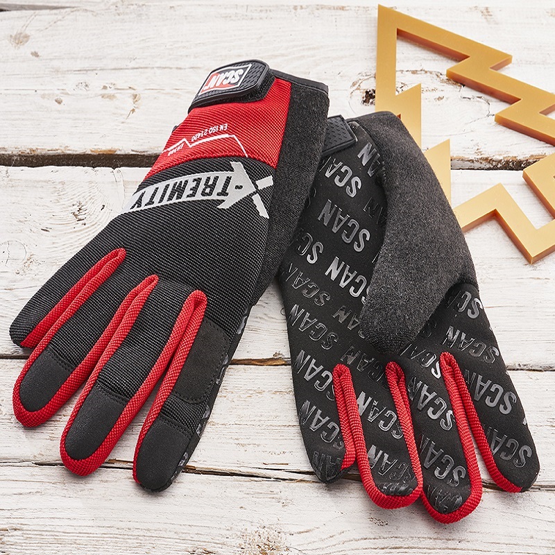 Pair of Scan Grip work gloves with red and black design on a wooden surface.