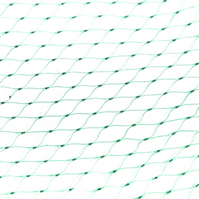 Close-up of green garden plant netting with a diamond pattern.