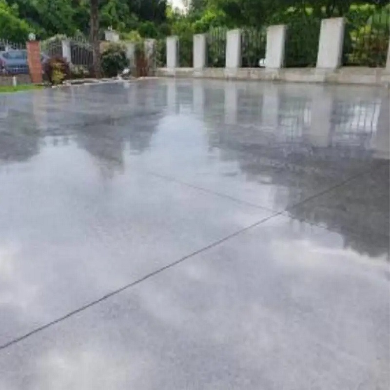 Smooth, polished concrete surface in an outdoor setting.