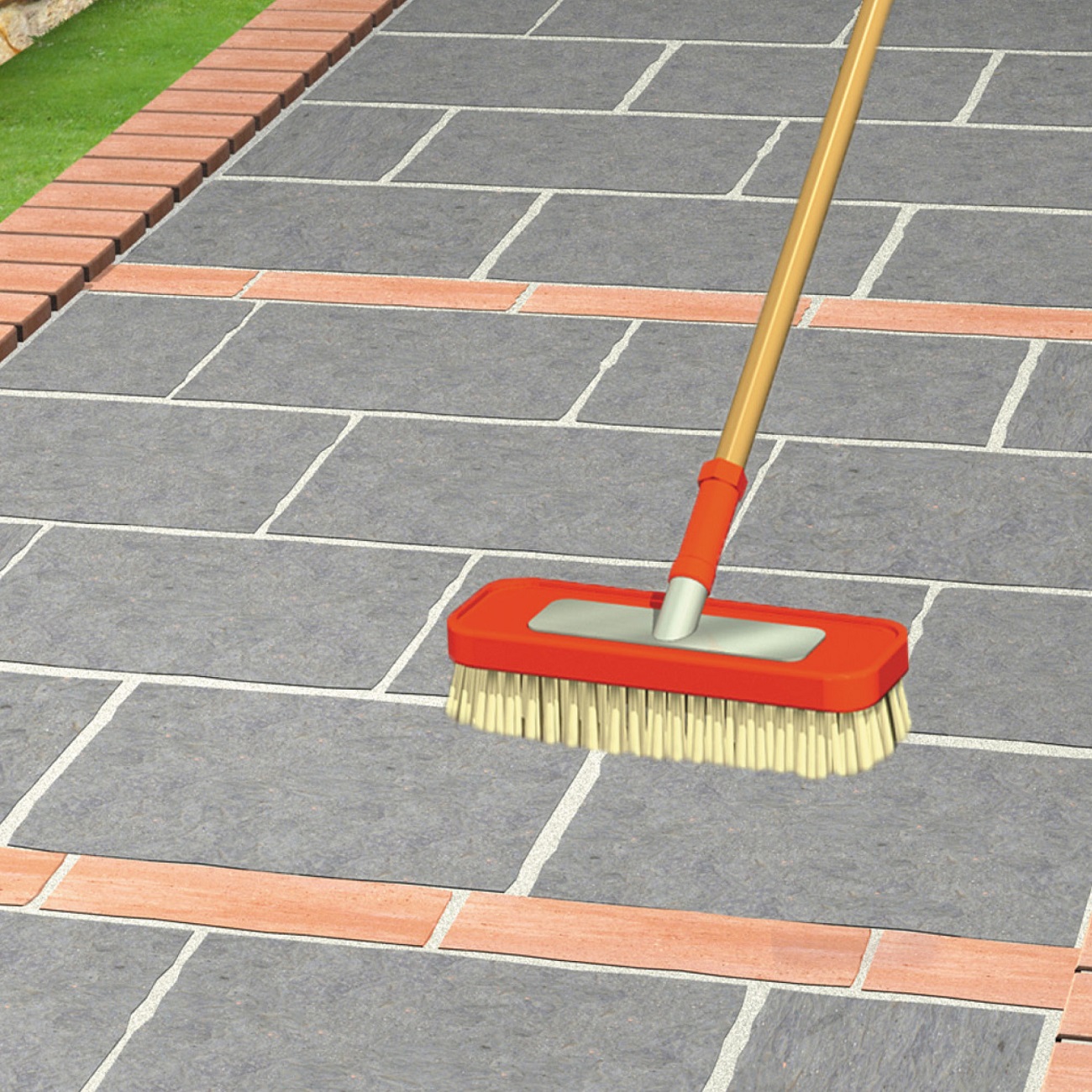 A brush applying sealer to a stone patio.