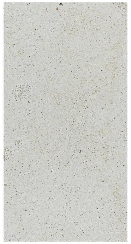 Ivory porcelain paving jointing compound with a smooth, speckled finish.
