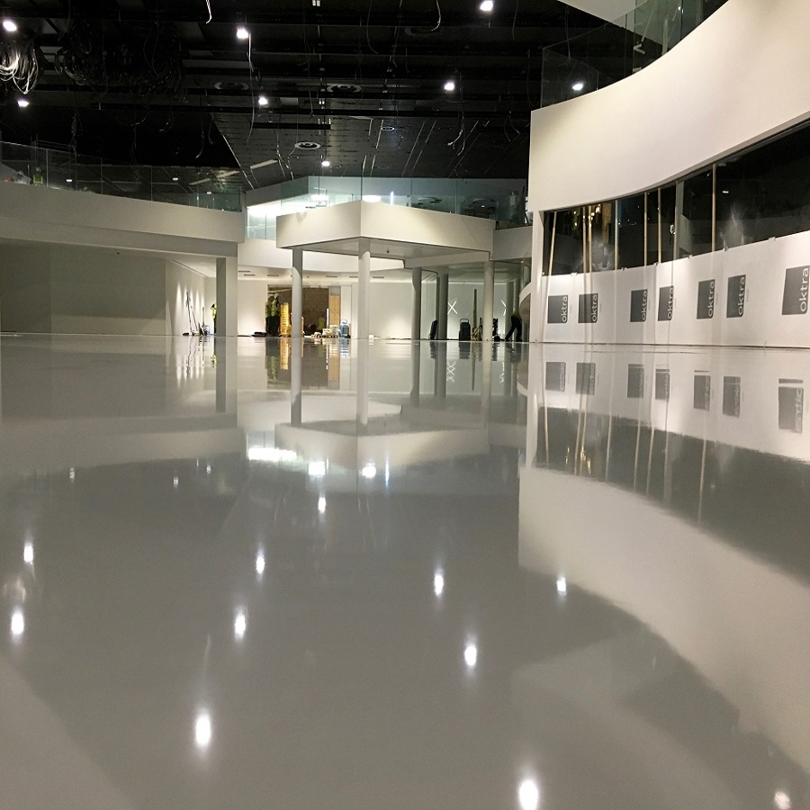 Smooth, reflective flooring in a modern interior space.