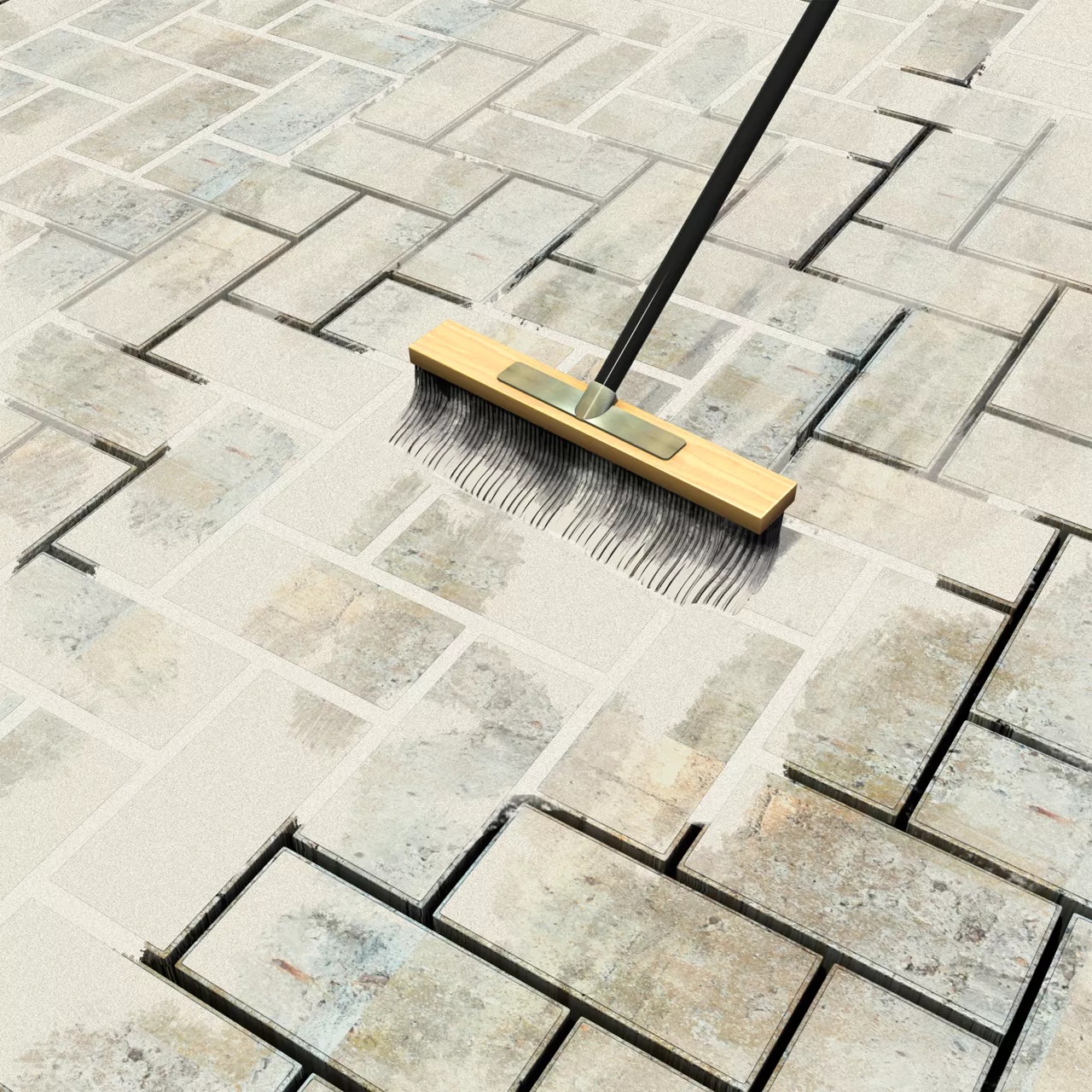 Broom spreading Sika Setting Sand Block Paving Narrow Joint Filler Buff between paving stones.