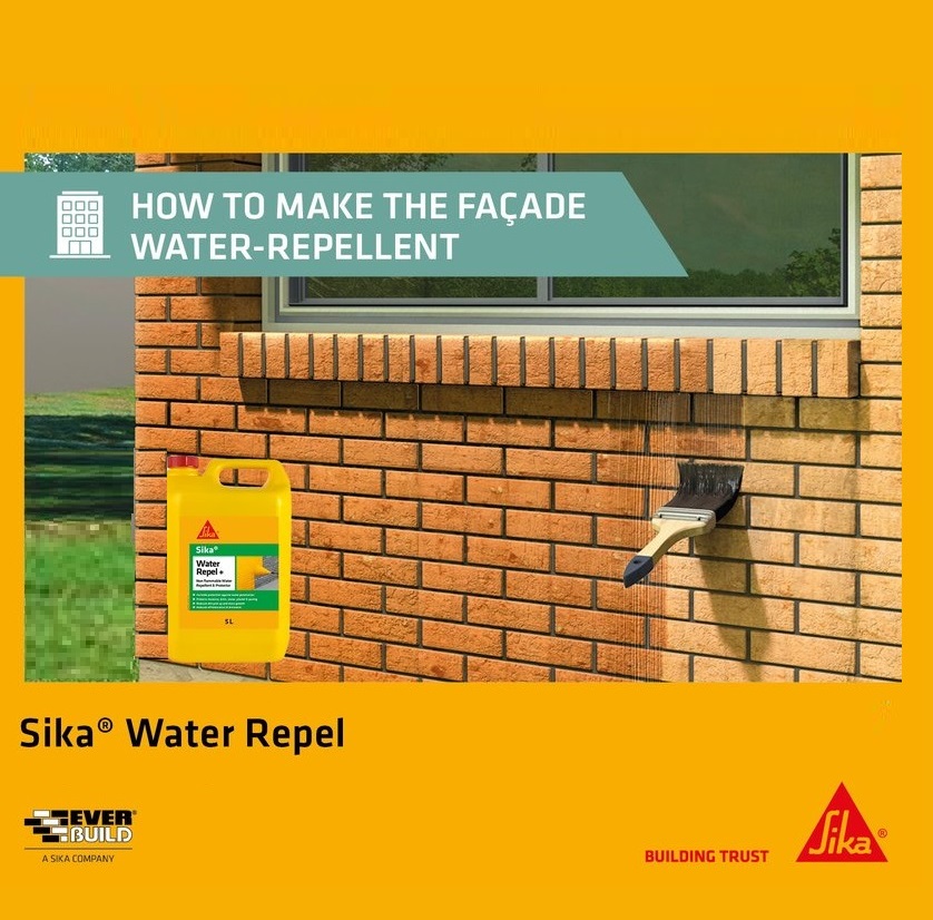  a brick wall being treated with Sika Water Repel, showing a brush applying the product to make the façade water-repellent.