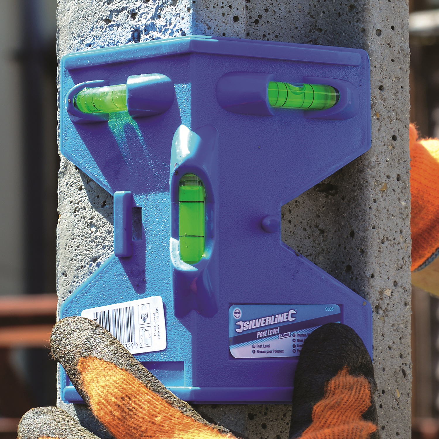 Blue Silverline 3 vial level with a concrete post zoomed