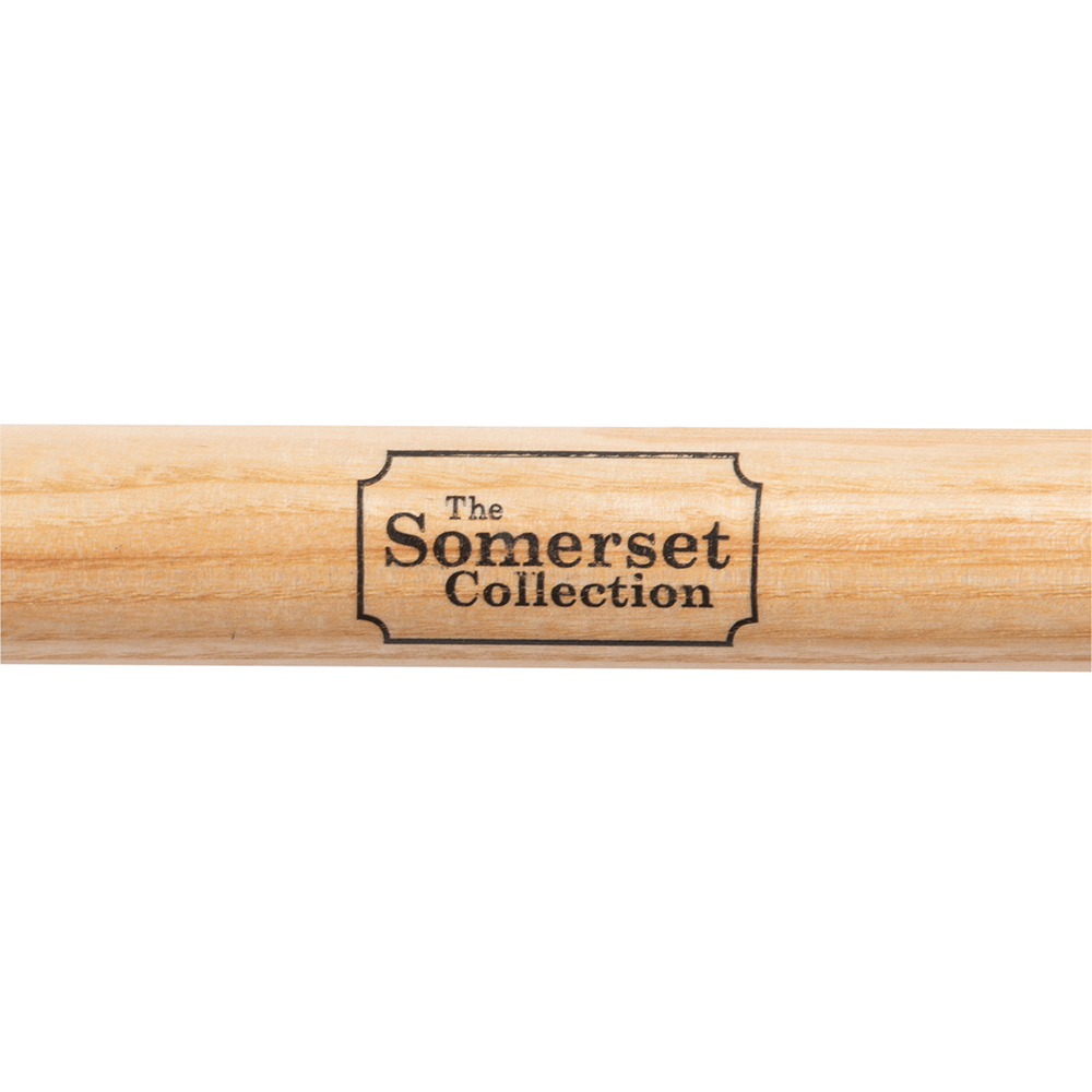 Close-up of the Somerset Collection logo on a wooden handle.