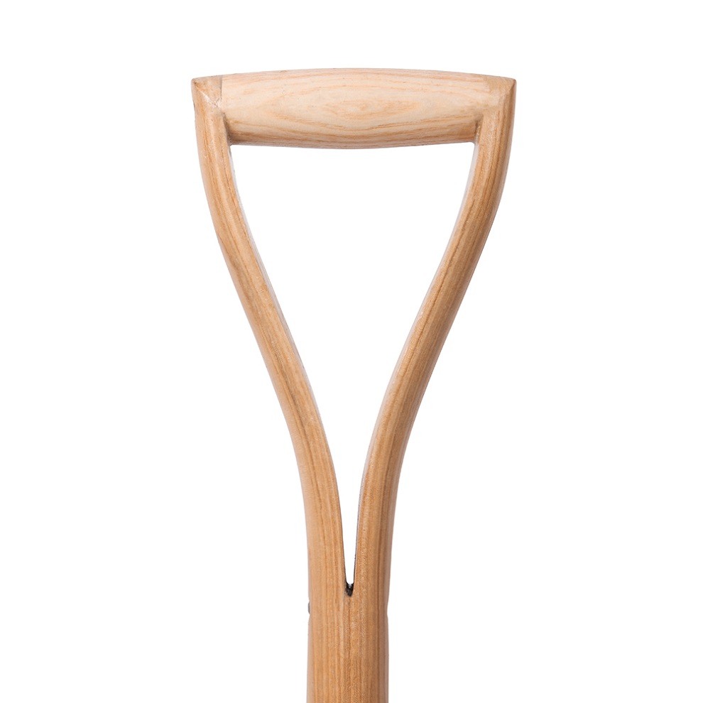 Wooden handle of a garden digging spade with a Y-shaped grip.