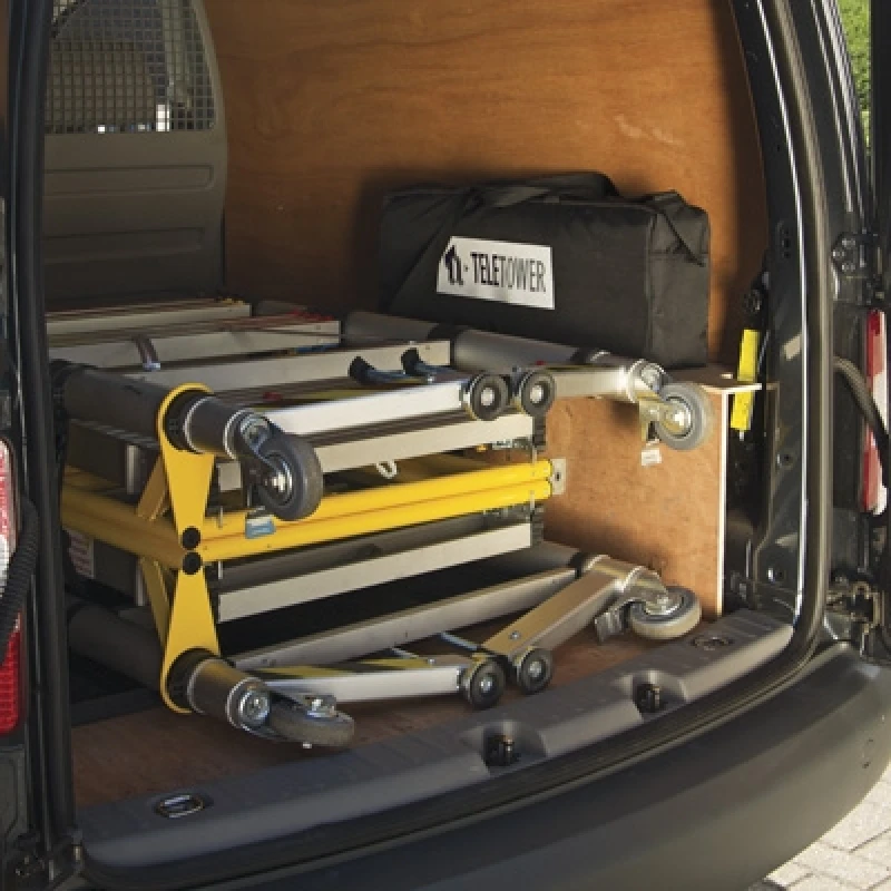 Folded Zarges Teletower Aluminium Telescopic Scaffold Tower stored in a van.