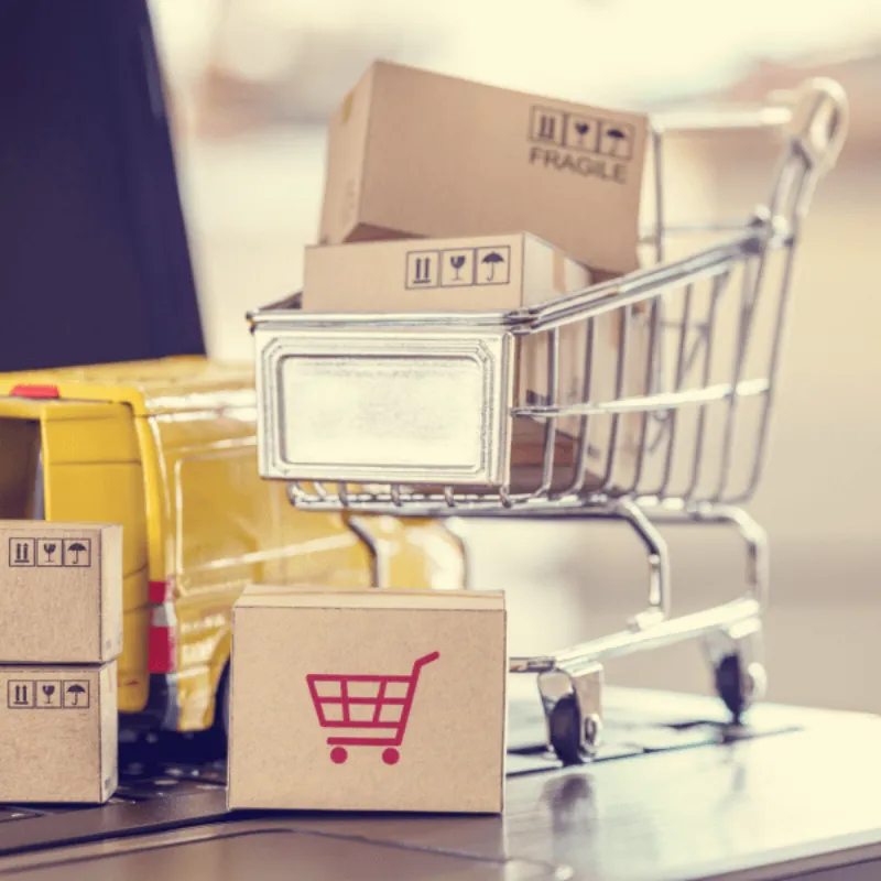 E-commerce and delivery concept with small trolley and van Custom Orders or Bulk Purchases