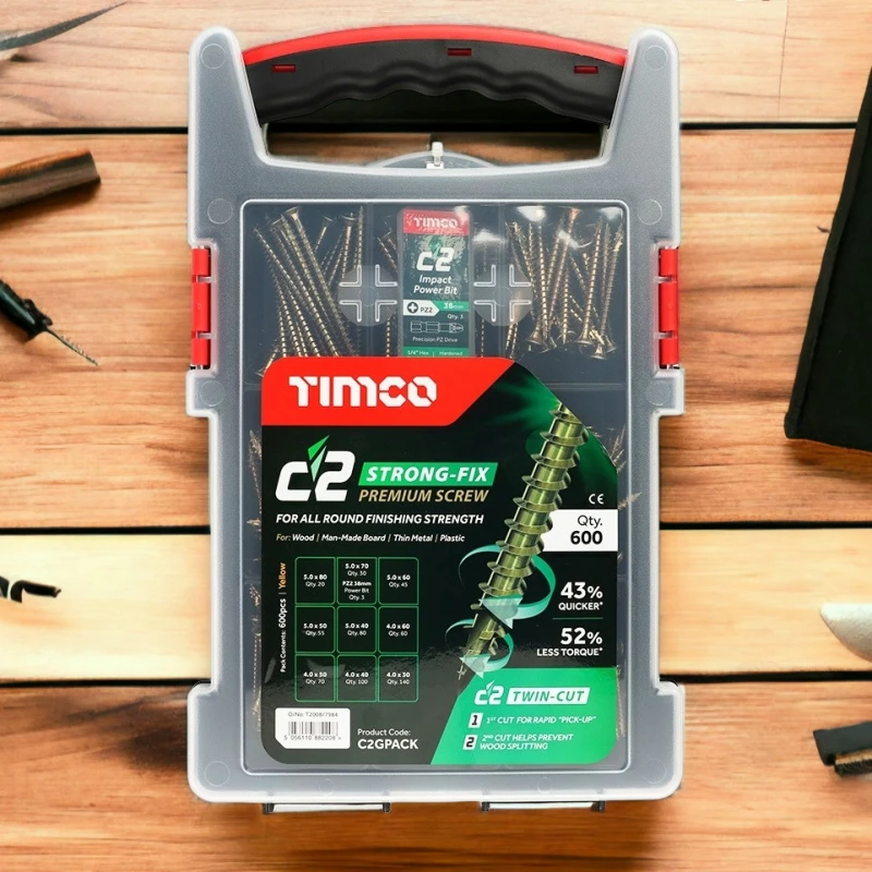 A plastic case containing Timco C2 Strong Fix Premium Multi-Use Pozi Screws, 600 pack, displayed on a wooden surface.