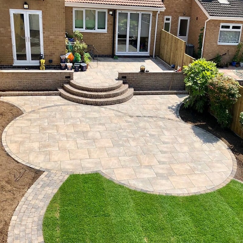 Modern patio with mixed natural stone and garden steps