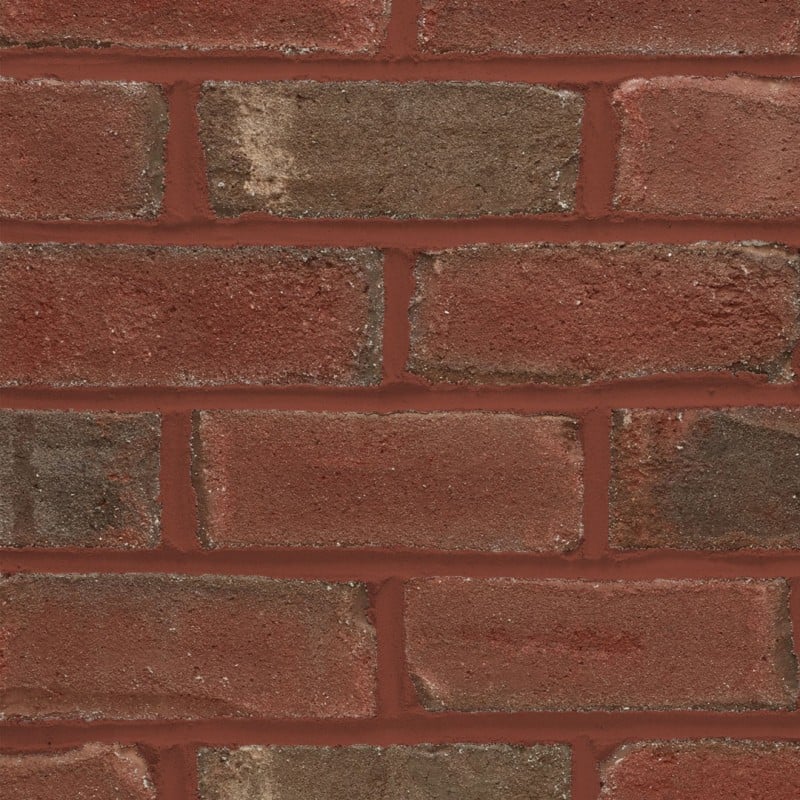 Red brick wall with tight mortar joints and clean finish