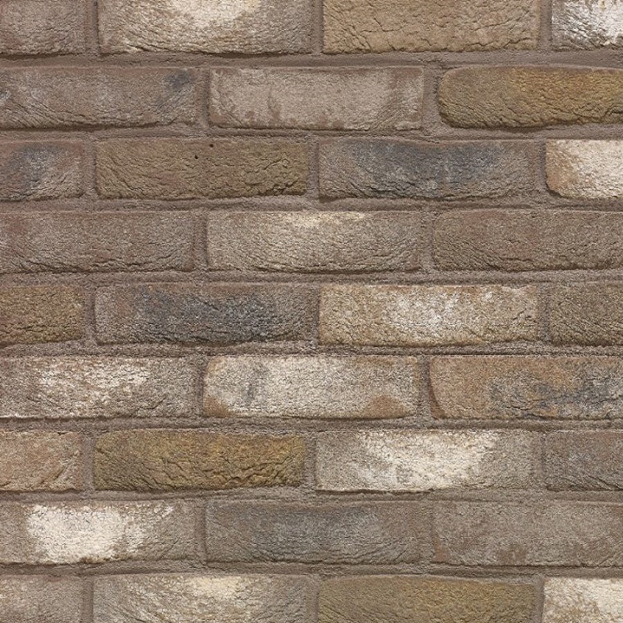 Close-up view of a textured brick wall with varying shades of brown and grey