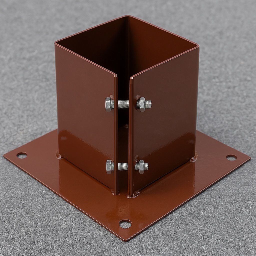 Brown metal clamping fence post shoe with bolt down design and four corner holes. on tarmac or concrete
