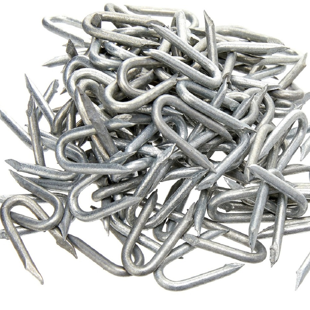 Pile of galvanised U-shaped wire netting staples, 15mm 20mm 25mm 30mm and 40mm in size.
