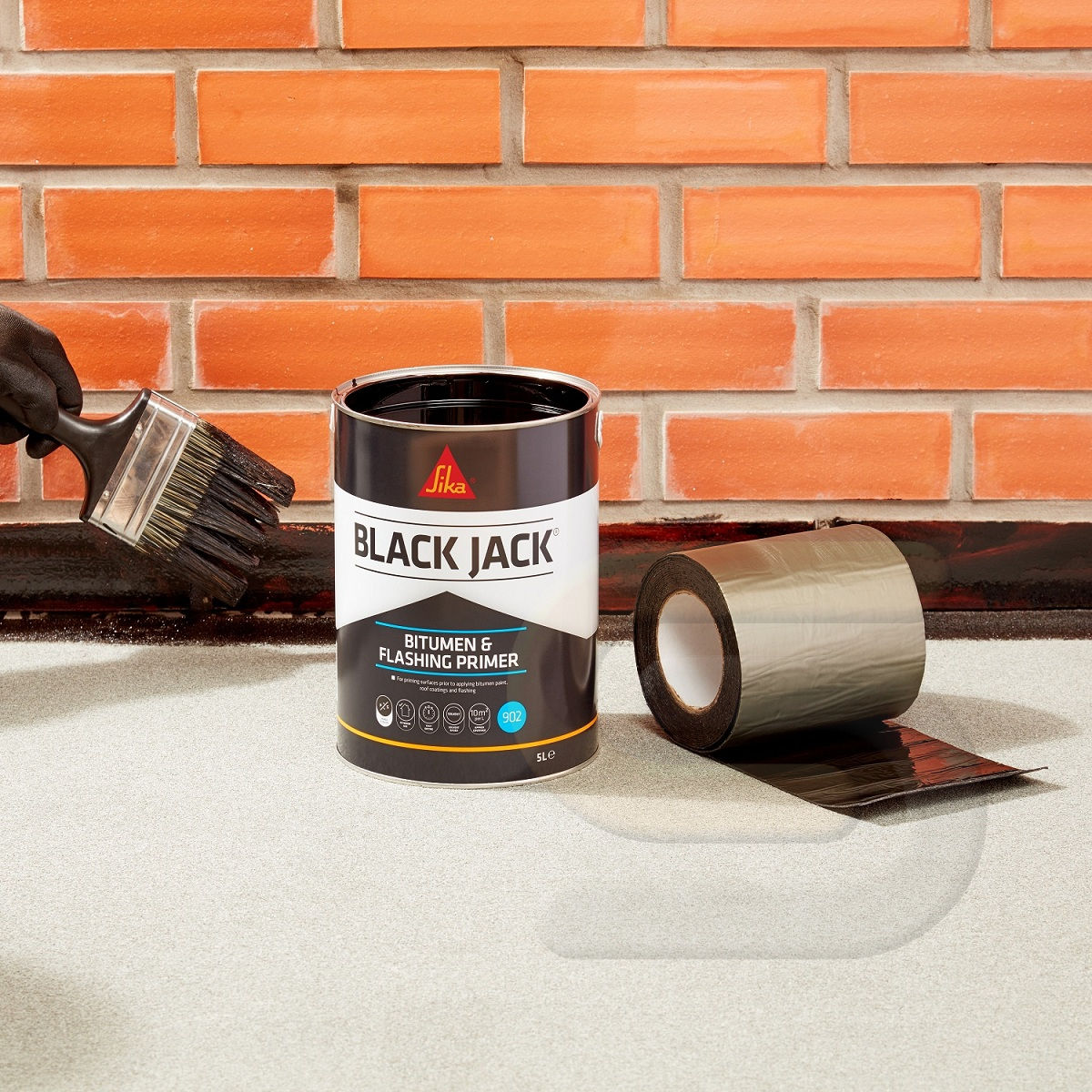 Sika Black Jack Flashing Tape being applied to a roof repair area