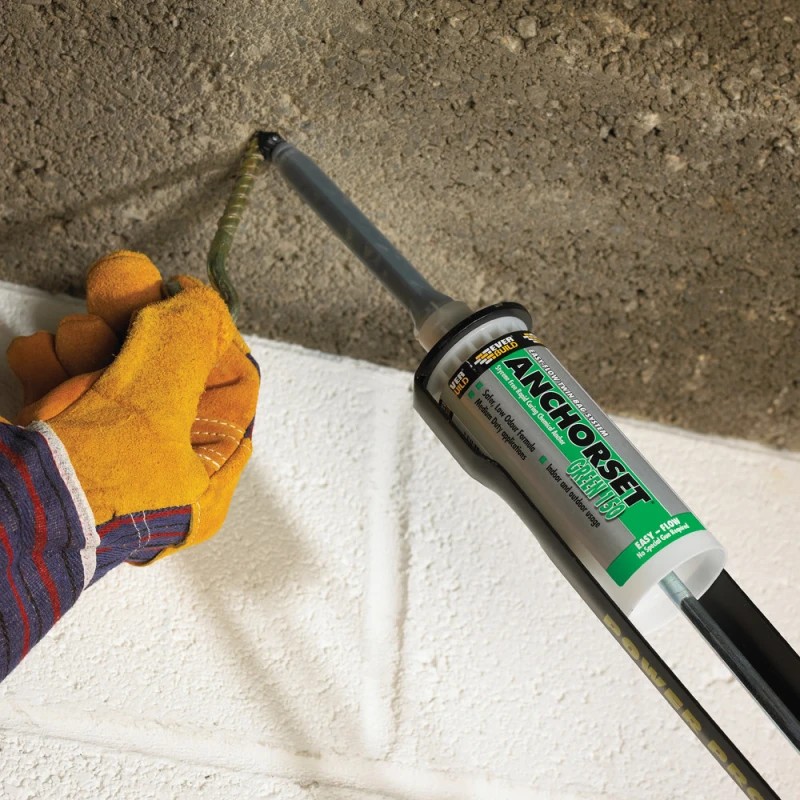 Hook fixing being inserted into Everbuild Anchorset Green chemical anchor resin in masonry