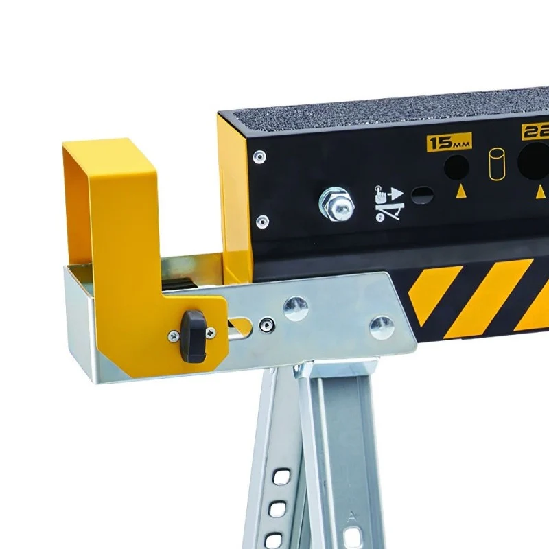 Detail of the yellow end support and top rail on a Roughneck Colt folding sawhorse.